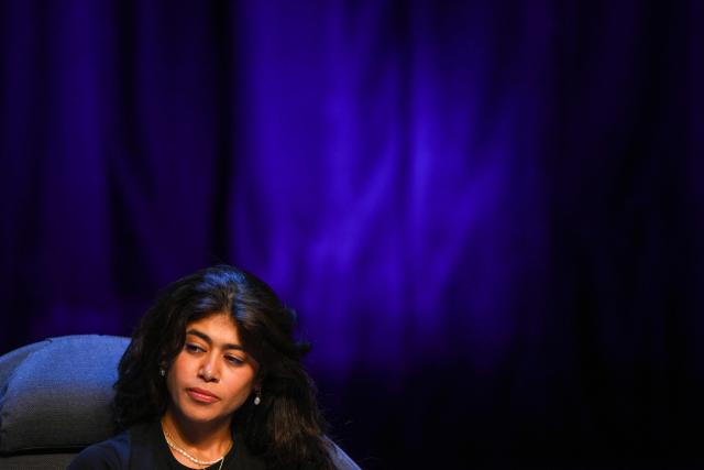 French-Palestinian member of the European Parliament Rima Hassan looks on while taking part in a discussion during the 'Amfis' party Summer Conferences 'Universites d'été' (Summer Seminars) of the French left wing party La France Insoumise (LFI) in Châteauneuf-sur-Isère, southeastern France, on August 22, 2026. With more than 8,000 people expected during the weekend, La France Insoumise had never organized summer universities this important. A militant fervor which, combined with Jean-Luc Melenchon's good polls, pushes LFI supporters to believe in victory in the 2027 French presidential election. (Photo by OLIVIER CHASSIGNOLE / AFP)