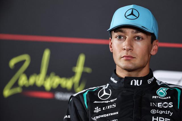 P2 Mercedes' British driver George Russell looks on during a press conference following the qualifying race of the Formula One Dutch Grand Prix at The Circuit Zandvoort, western Netherlands, on August 22, 2026. (Photo by SIMON WOHLFAHRT / AFP)