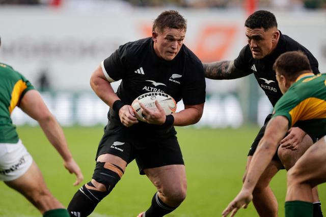 New Zealand's prop Ethan de Groot runs with the ball during the Rugby's Greatest Rivalry international rugby union match between South Africa and New Zealand at Ellis Park Stadium in Johannesburg, on August 22, 2026. (Photo by PHILL MAGAKOE / AFP)
