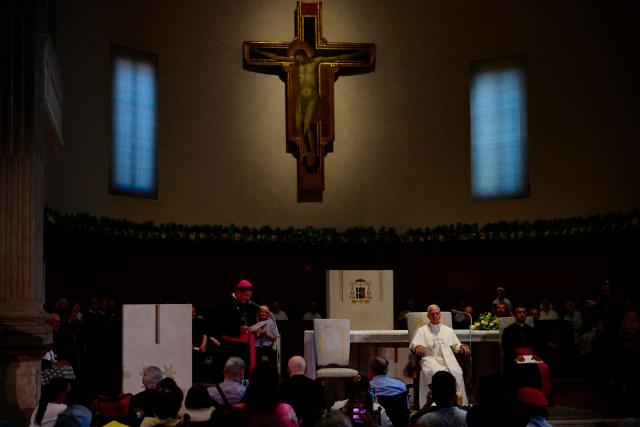Pope Leo XIV attends a meeting with the sicks, disabled and people assisted by Caritas at the cathedral of Rimini, during a pastoral visit in Rimini on August 22, 2026. (Photo by Stefano Rellandini / AFP)