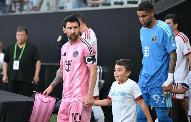 Inter Miami's Argentine forward #10 Lionel Messi and Inter Miami's Canadian goalkeeper #97 Dayne St. Clair step on the pitch ahead of the Major League Soccer (MLS) regular season football match between Inter Miami CF and Toronto FC at Nu Stadium in Miami, Florida, on August 22, 2026. (Photo by CHANDAN KHANNA / AFP)
