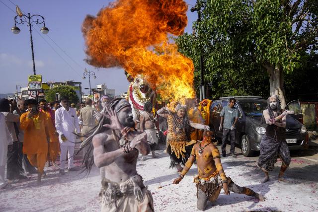 Hindu devotees demonstrate their skills as they take part in a religious procession during the sacred month of Shravan dedicated to Hindu God Shiva in Ajmer on August 23, 2026. (Photo by Himanshu SHARMA / AFP)