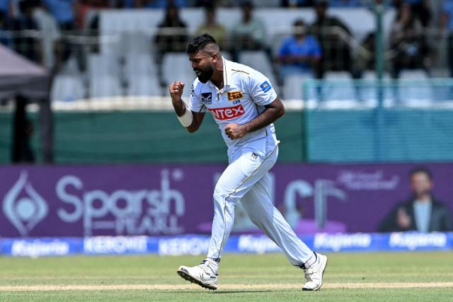 Sri Lanka's Lahiru Kumara celebrates after taking the wicket of India's KL Rahul during the first day of the second Test cricket match between Sri Lanka and India at the Sinhalese Sports Club Ground in Colombo on August 23, 2026. (Photo by Ishara S. KODIKARA / AFP)