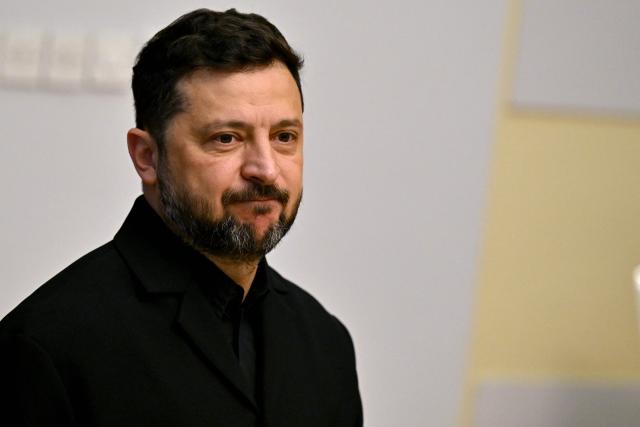 (FILES) Ukraine's President Volodymyr Zelensky arrives to attend the meeting with Serbian President at the Palace of Serbia, in Belgrade on August 8, 2026. Zelensky said in remarks made public on August 26, 2026, wartime elections would currently be too dangerous for Ukraine, after a call by his former defence minister to organise a vote. "I believe that in a war like this, elections as such are a huge risk. Elections right now are a tsunami for the country that will split Ukraine," Zelensky said. (Photo by Andrej ISAKOVIC / AFP)