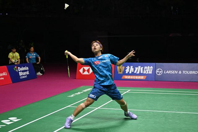 Japan's Kodai Naraoka hits a return to France's Alex Lanier during the BWF World Championships men's singles final badminton match at the Indira Gandhi Indoor Stadium in New Delhi on August 23, 2026. (Photo by Sajjad HUSSAIN / AFP)
