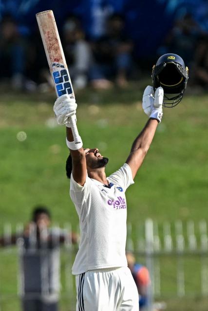 India's Devdutt Padikkal celebrates after scoring a century (100 runs) during the first day of the second Test cricket match between Sri Lanka and India at the Sinhalese Sports Club Ground in Colombo on August 23, 2026. (Photo by Ishara S. KODIKARA / AFP)