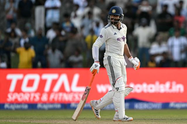 India's Ravindra Jadeja walks back to the pavilion after his dismissal during the first day of the second Test cricket match between Sri Lanka and India at the Sinhalese Sports Club Ground in Colombo on August 23, 2026. (Photo by Ishara S. KODIKARA / AFP)