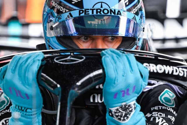 Mercedes' British driver George Russell enters his car ahead of the Formula One Dutch Grand Prix at The Circuit Zandvoort, western Netherlands, on August 23, 2026. (Photo by JOHN THYS / AFP)