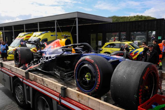 Red Bull Racing's Dutch driver Max Verstappen's car is moved following his crash during the Formula One Dutch Grand Prix at The Circuit Zandvoort, western Netherlands, on August 23, 2026. (Photo by JOHN THYS / AFP)