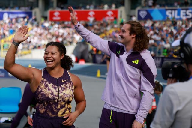 Canada's Camryn Rogers and Canada's Ethan Katzberg celebrate after the men's hammer throw event of the Silesia Diamond League athletics meeting in Katowice, Poland, on August 23, 2026. (Photo by Wojtek RADWANSKI / AFP)