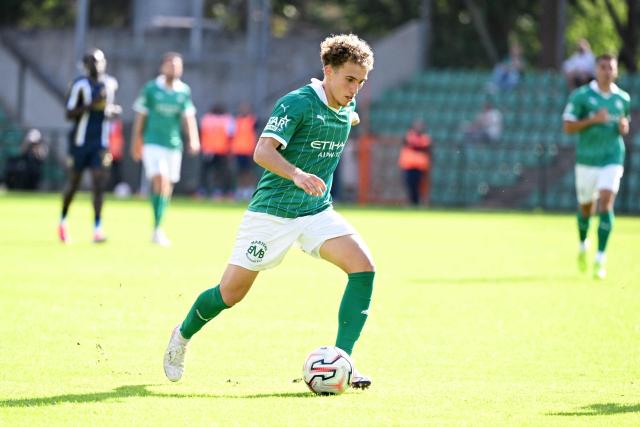 Lommel Hungarian forward #93 Zalan Vancsa runs with the ball during the Belgian Pro League football match between Lommel SK and KVC Westerlo at the Soevereinstadion Stadium in Lommel on August 23, 2026. (Photo by Maarten STRAETEMANS / Belga / AFP) / Belgium OUT