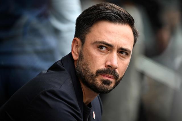Lille’s Italian head coach Davide Ancelotti looks on during the French L1 football match between Angers SCO and LOSC Lille at the Stade Raymond Kopa in Angers, western France on August 23, 2026. (Photo by Sebastien Salom-Gomis / AFP)