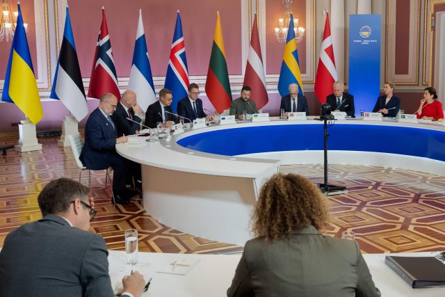 (from L) Iceland's ambassador Fridrik Jonsson, Latvia's Prime Minister Andris Kulbergs, Finland's President Alexander Stubb, Estonia's Prime Minister Kristen Michal, Ukraine's President Volodymyr Zelensky, Norway's Prime Minister Jonas Gahr Store, Lithuania's President Gitana Nauseda and Denmark's Prime Minister Mette Frederiksen and Swedish diplomat Elsa Hastad take part in the Nordic-Baltic Eight (NB8) summit in Kyiv on August 23, 2026, amid Russias invasion of Ukraine. (Photo by Tetiana DZHAFAROVA / AFP)