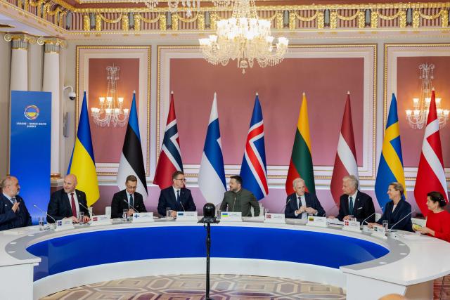 (from L) Iceland's ambassador Fridrik Jonsson, Latvia's Prime Minister Andris Kulbergs, Finland's President Alexander Stubb, Estonia's Prime Minister Kristen Michal, Ukraine's President Volodymyr Zelensky, Norway's Prime Minister Jonas Gahr Store, Lithuania's President Gitana Nauseda and Denmark's Prime Minister Mette Frederiksen and Swedish diplomat Elsa Hastad take part in the Nordic-Baltic Eight (NB8) summit in Kyiv on August 23, 2026, amid Russias invasion of Ukraine. (Photo by Tetiana DZHAFAROVA / AFP)