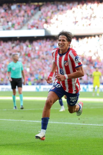 Atletico Madrid's Argentine forward #20 Giuliano Simeone celebrates scoring his team's second goal during the Spanish league football match between Club Atletico de Madrid and Villarreal CF at Metropolitano Stadium in Madrid on August 23, 2026. (Photo by Pierre-Philippe MARCOU / AFP)
