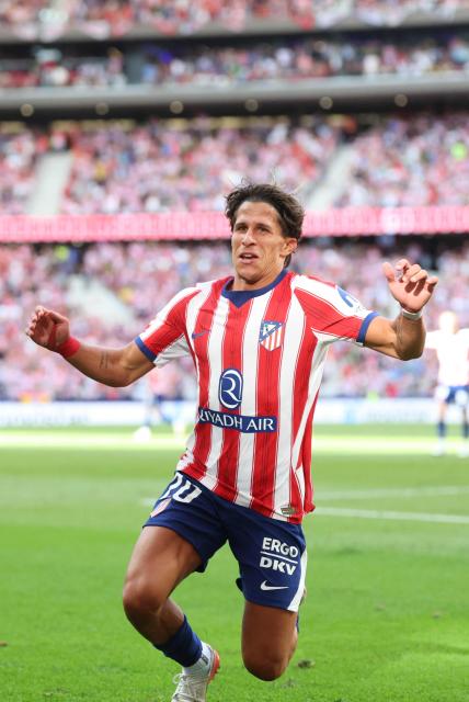 Atletico Madrid's Argentine forward #20 Giuliano Simeone celebrates scoring his team's second goal during the Spanish league football match between Club Atletico de Madrid and Villarreal CF at Metropolitano Stadium in Madrid on August 23, 2026. (Photo by Pierre-Philippe MARCOU / AFP)