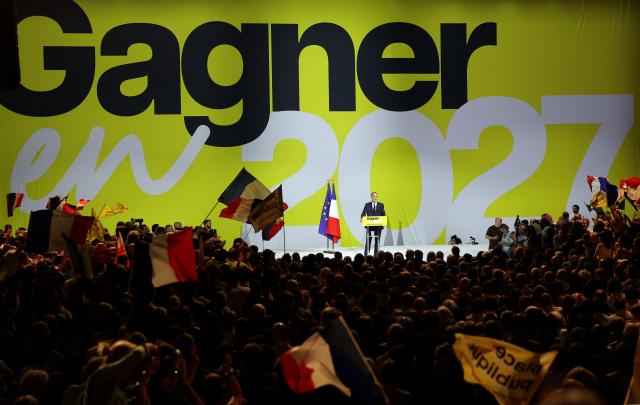 (FILES) Place publique's centre-left party leader and France's MEP Raphael Glucksmann addresses a political rally ahead of the 2027 French presidential election in Aubervilliers, a northern suburb of Paris, on June 13, 2026. Commentator-turned-politician Raphael Glucksmann on April 23, 2026, announced his candidacy for France's presidential election next year, joining a crowded field of far-right figures, centrists and fellow left-wingers. (Photo by Kenzo TRIBOUILLARD / AFP)