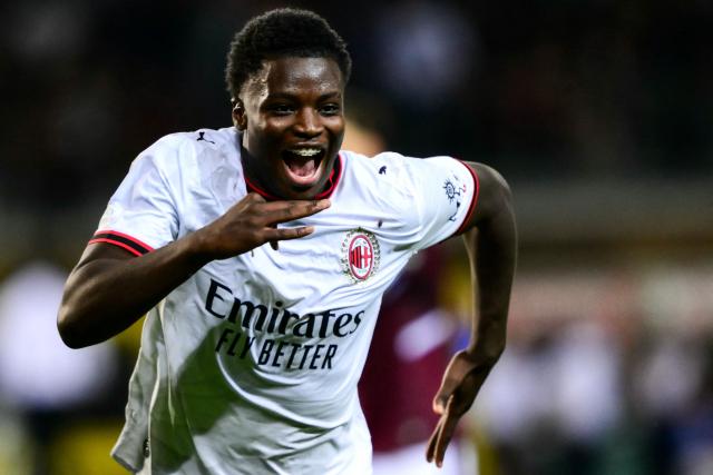 AC Milan’s Italian midfielder #70 Alphadjo Cisse celebrates after scoring his team first goal during the Italian Serie A football match between Torino FC and AC Milan at the Olympic Stadium Grande Torino in Turin, northern Italy on August 23, 2026. (Photo by Marco Bertorello / AFP)