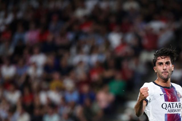 PSG's Spanish forward #09 Ferran Torres celebrates after scoring his team second goal during the French L1 football match between Stade Rennais FC and Paris Saint-Germain (PSG) at the Roazhon Park stadium in Rennes, western France on August 23, 2026. (Photo by ALAIN JOCARD / AFP)