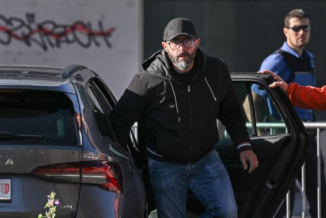 (FILES) Co-owner of Le Constellation bar Jacques Moretti arrives to attend a hearing as part of the inquiry into a devastating New Year's fire in Sion on June 5, 2026. Jacques Moretti ,the French owner and manager of the bar in the Swiss resort of Crans-Montana that was set on fire on New Years Eve has been placed in pre-trial detention on the night of August 11 to 12 for domestic violence, the Swiss television channel Léman Bleu reported on August 23, 2026. According to information from the Geneva-based channel, Jacques Moretti was arrested following alleged acts of violence against his wife, Jessica Moretti, during the night of August 11 to 12 at their home in the canton of Valais. He was subsequently placed in pre-trial detention. (Photo by Fabrice COFFRINI / AFP)