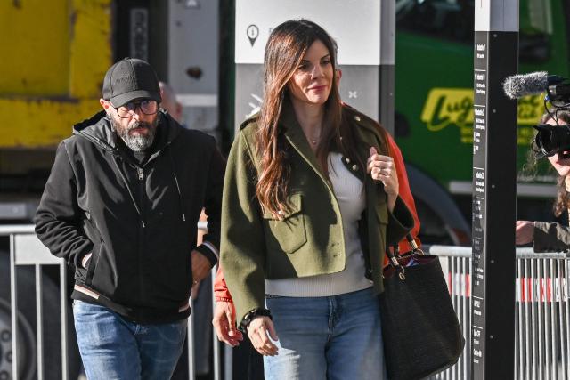 (FILES) Owners of Le Constellation bar Jessica Moretti (R) and Jacques Moretti arrive to attend a hearing as part of the inquiry into a devastating New Year's fire in Sion on June 5, 2026. Jacques Moretti ,the French owner and manager of the bar in the Swiss resort of Crans-Montana that was set on fire on New Years Eve has been placed in pre-trial detention on the night of August 11 to 12 for domestic violence, the Swiss television channel Léman Bleu reported on August 23, 2026. According to information from the Geneva-based channel, Jacques Moretti was arrested following alleged acts of violence against his wife, Jessica Moretti, during the night of August 11 to 12 at their home in the canton of Valais. He was subsequently placed in pre-trial detention. (Photo by Fabrice COFFRINI / AFP)