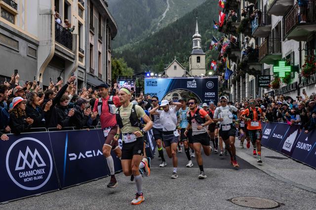 (FILES) French trailer Francois d’Haene and other competitors take the start of the 22nd edition of the Ultra Trail du Mont Blanc (UTMB), a 174km trail race crossing France, Italy and Switzerland, in Chamonix, south-eastern France on August 29, 2025. In Chamonix, the UTMB — which 23rd edition begins on August 24, 2026 — divides locals: some cherish it, while others complain the town is overwhelmed, with traffic jams and crowds making daily life difficult for a week. The event brings together more than 10,000 runners across eight races, including Friday's flagship event — a 174 km loop with 9,900 m of elevation gain around Mont Blanc — which will field 2,500 participants, up from just 300 entrants in the single race held at the first edition in 2003. (Photo by JEFF PACHOUD / AFP)