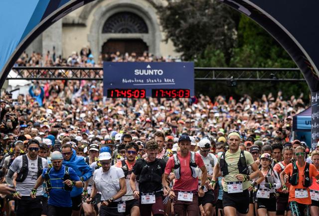 (FILES) French trailer Francois d’Haene and other competitors take the start of the 22nd edition of the Ultra Trail du Mont Blanc (UTMB), a 174km trail race crossing France, Italy and Switzerland, in Chamonix, south-eastern France on August 29, 2025. In Chamonix, the UTMB — which 23rd edition begins on August 24, 2026 — divides locals: some cherish it, while others complain the town is overwhelmed, with traffic jams and crowds making daily life difficult for a week. The event brings together more than 10,000 runners across eight races, including Friday's flagship event — a 174 km loop with 9,900 m of elevation gain around Mont Blanc — which will field 2,500 participants, up from just 300 entrants in the single race held at the first edition in 2003. (Photo by JEFF PACHOUD / AFP)