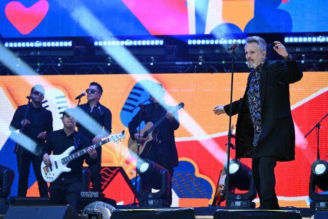 Spanish singer Miguel Bose performs on stage during the "Voces por la Vida" charity concert to support people affected by the 7.4-magnitude earthquake at the Vive Claro Distrito Cultural music venue in Bogota on August 23, 2026. (Photo by Raul ARBOLEDA / AFP)