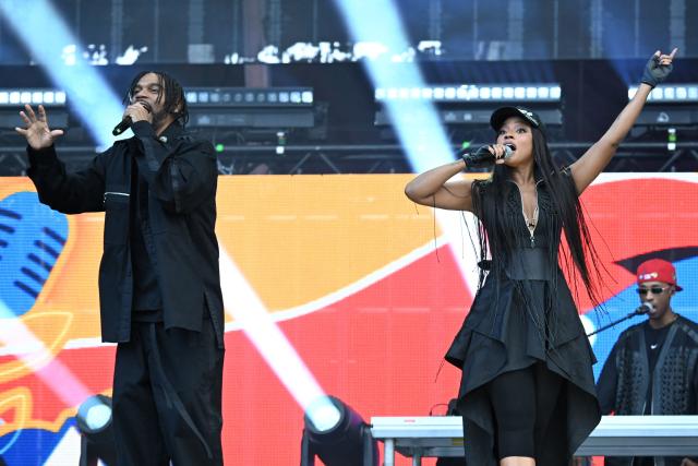 Colombian Hip hop group ChocQuibTown perform on stage during the "Voces por la Vida" charity concert to support people affected by the 7.4-magnitude earthquake at the Vive Claro Distrito Cultural music venue in Bogota on August 23, 2026. (Photo by Raul ARBOLEDA / AFP)