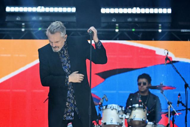 Spanish singer Miguel Bose performs on stage during the "Voces por la Vida" charity concert to support people affected by the 7.4-magnitude earthquake at the Vive Claro Distrito Cultural music venue in Bogota on August 23, 2026. (Photo by Raul ARBOLEDA / AFP)