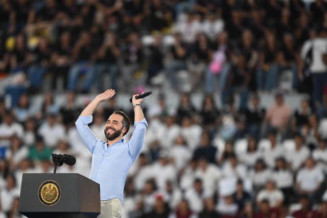 El Salvador's President Nayib Bukele gestures during a meeting with more than 30,000 students at the Jorge “El Mбgico” Gonzбlez Stadium in San Salvador on August 23, 2026. (Photo by MARVIN RECINOS / AFP)