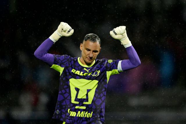 Pumas' Costa Rican goalkeeper #01 Keylor Navas celebrates his team's first goal scored by teammate forward #14 Luciano Herrera (out of frame) during the Liga MX Apertura tournament football match between Pumas and Necaxa at the Olimpico Universitario stadium in Mexico City on August 23, 2026. (Photo by Alfredo ESTRELLA / AFP)