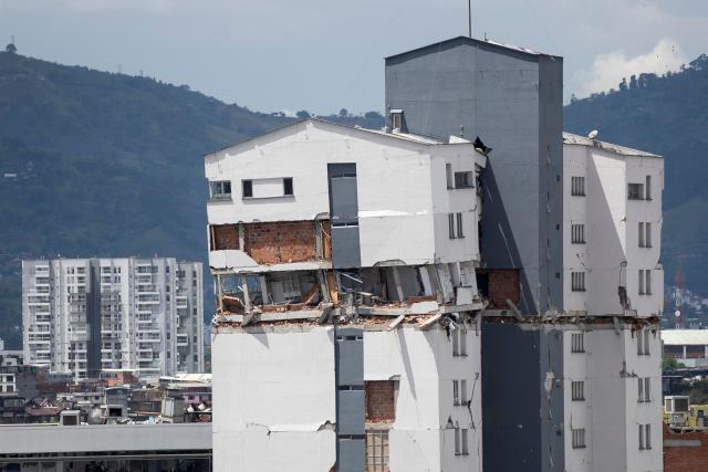 A collapsed building affected by the 7.4-magnitude earthquake is pictured in Pereira, Risaralda department, Colombia, on August 23, 2026. The powerful earthquake that killed hundreds of people in western Colombia caused $9.57 billion in economic losses, President Abelardo de la Espriella said on August 18, issuing a preliminary estimate. (Photo by Esteban Vega La-Rotta / AFP)