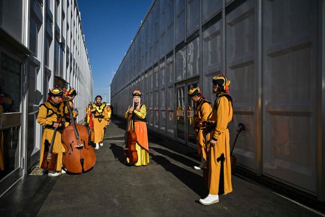 Musicians prepare to perform in the opening ceremony of the 17th Session of the Conference of the Parties (COP17) to the United Nations Convention to Combat Desertification (UNCCD) in Ulaanbaatar on August 24, 2026. (Photo by Hector RETAMAL / AFP)