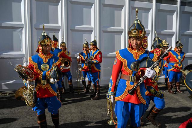 Musicians prepare to perform in the opening ceremony of the 17th Session of the Conference of the Parties (COP17) to the United Nations Convention to Combat Desertification (UNCCD) in Ulaanbaatar on August 24, 2026. (Photo by Hector RETAMAL / AFP)