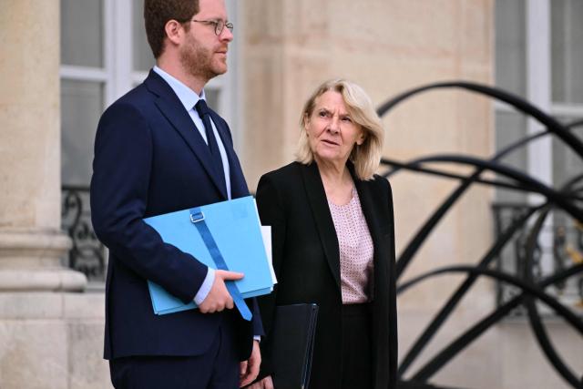 France's junior Minister for civil service David Amiel and France's Culture Minister Catherine Pegard leave after the weekly cabinet meeting at the Elysee Palace in Paris on August 24, 2026. (Photo by LOU BENOIST / AFP)