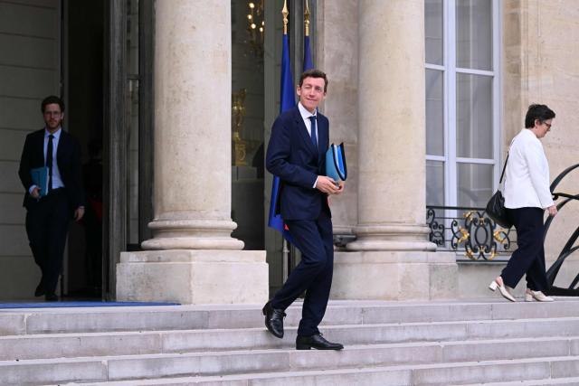 France's Education Minister  Edouard Geffray (C) leaves after the weekly cabinet meeting at the Elysee Palace in Paris on August 24, 2026. (Photo by LOU BENOIST / AFP)