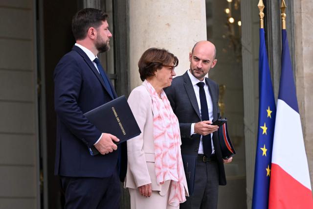 (LtoR) France's Housing Minister Vincent Jeanbrun, France's Agriculture Minister Annie Genevard and France's Foreign Affairs Minister Jean-Noel Barrot leave after the weekly cabinet meeting at the Elysee Palace in Paris on August 24, 2026. (Photo by LOU BENOIST / AFP)
