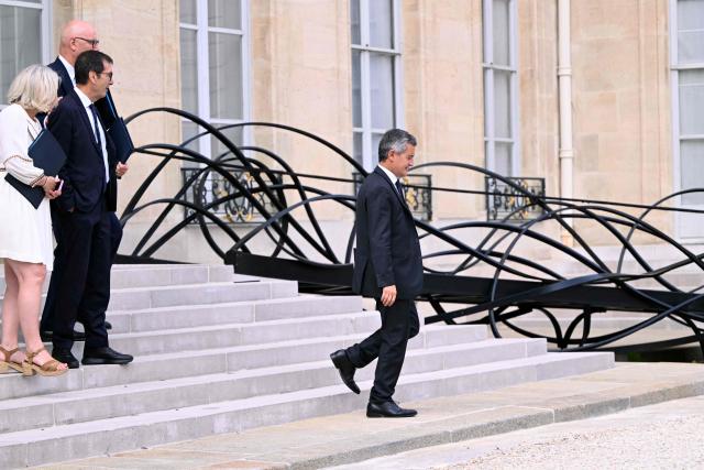 France's Justice Minister Gerald Darmanin leaves after the weekly cabinet meeting at the Elysee Palace in Paris on August 24, 2026. (Photo by LOU BENOIST / AFP)