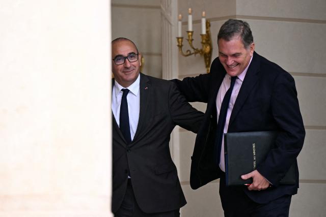France's Interior Minister Laurent Nunez and France's Transports Minister Philippe Tabarot leave after the weekly cabinet meeting at the Elysee Palace in Paris on August 24, 2026. (Photo by LOU BENOIST / AFP)