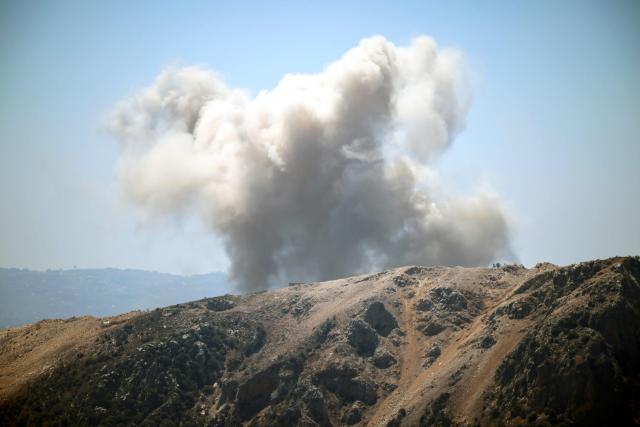 This photograph taken from the southern Lebanese area of Marjayoun shows smoke as it rises following a controlled blast by Israeli forces in the southern area of Yohmor on August 24, 2026. Lebanon was drawn into the Middle East war on March 2, when pro-Iran Hezbollah launched rockets towards Israel in response to US-Israeli strikes that killed Iranian supreme leader on February 28, 2026. Despite a November 2024 ceasefire that was supposed to end more than a year of hostilities between Israel and the Iran-backed Hezbollah group, Israel has kept up strikes on Lebanon and has maintained troops in areas in southern Lebanon it deems strategic. (Photo by AFP) / 