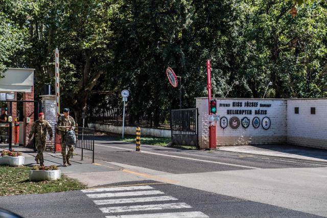 The entrance to the Military Airfield where a Hungarian Air Force JAS 39 Gripen fighter jet crashed in Szolnok, about 110 kilometres east of Budapest, is pictured on August 24, 2026. The pilot ejected safely and remains in stable condition. Initial reports indicate no injuries and no damage to civilian infrastructure, while an investigation into the cause of the crash is under way. (Photo by FERENC ISZA / AFP)