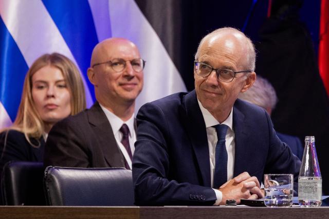 Luxembourg's Prime Minister Luc Frieden reacts during the Coalition of the Willing meeting, in Kyiv on August 24, 2026. The United Kingdom will keep providing defence aid to Ukraine despite Russia's threats, Prime Minister Andy Burnham said on August 24, 2026 on a visit to Kyiv where allies gathered to discuss support. Air defence supplies are due to be the main priority at the meeting of the Coalition of the Willing, jointly chaired by the leaders of France and Germany, who will participate remotely, and by Britain's Burnham. (Photo by Tetiana DZHAFAROVA / AFP)