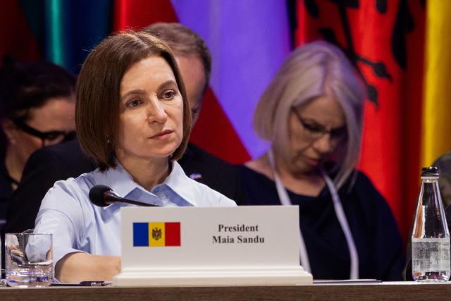 Moldova's President Maia Sandu  reacts during the Coalition of the Willing meeting, in Kyiv on August 24, 2026. The United Kingdom will keep providing defence aid to Ukraine despite Russia's threats, Prime Minister Andy Burnham said on August 24, 2026 on a visit to Kyiv where allies gathered to discuss support. Air defence supplies are due to be the main priority at the meeting of the Coalition of the Willing, jointly chaired by the leaders of France and Germany, who will participate remotely, and by Britain's Burnham. (Photo by Tetiana DZHAFAROVA / AFP)