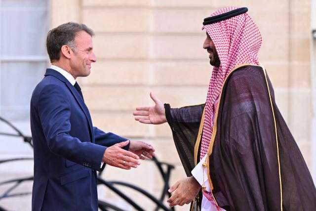 France's President Emmanuel Macron welcomes Saudi Arabia's Crown Prince Mohammed bin Salman for a meetingat The Elysee Presidential Palace in Paris on August 24, 2026. (Photo by LOU BENOIST / AFP)