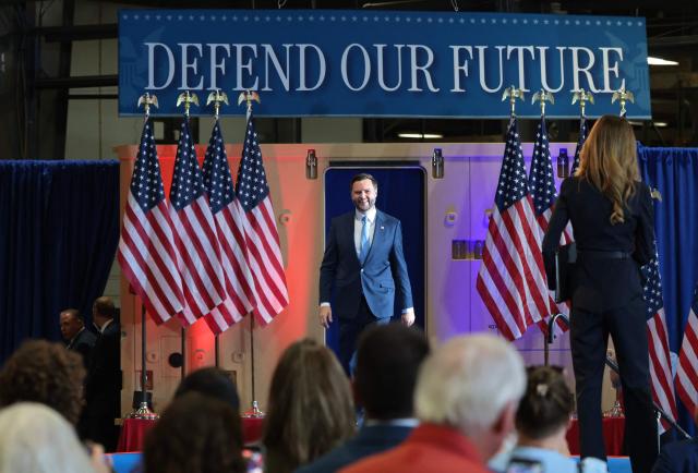 US Vice President JD Vance arrives on stage to speak at CompoTech, a defense technology and advanced manufacturing company, in Brewer, Maine on August 24, 2026. (Photo by Anna Moneymaker / POOL / AFP)