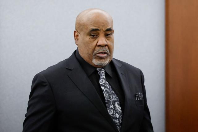 Duane Davis enters the courtroom during his murder trial, related to the 1996 killing of rapper Tupac Shakur, at Clark County District Court at the Regional Justice Center in Las Vegas, Nevada, on August 24, 2026. The trial of the former gang leader accused of orchestrating the murder of rapper Tupac Shakur began on August 10, 30 years after one of America's most high-profile unresolved killings. The proceedings, expected to last a month, will likely not make clear who fired the shots that killed the California hip-hop legend on the night of September 7, 1996, while he was in Las Vegas to see a Mike Tyson boxing match. (Photo by Caroline Brehman / POOL / AFP)