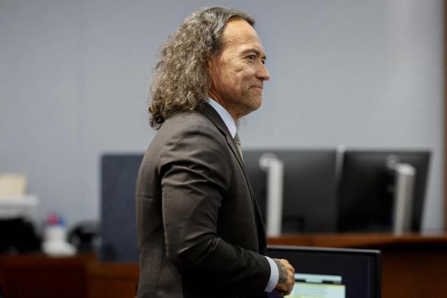 Attorney Michael Sanft looks on during the murder trial of Duane Davis, related to the 1996 killing of rapper Tupac Shakur, at Clark County District Court at the Regional Justice Center in Las Vegas, Nevada, on August 24, 2026. The trial of the former gang leader accused of orchestrating the murder of rapper Tupac Shakur began on August 10, 30 years after one of America's most high-profile unresolved killings. The proceedings, expected to last a month, will likely not make clear who fired the shots that killed the California hip-hop legend on the night of September 7, 1996, while he was in Las Vegas to see a Mike Tyson boxing match. (Photo by Caroline Brehman / POOL / AFP)