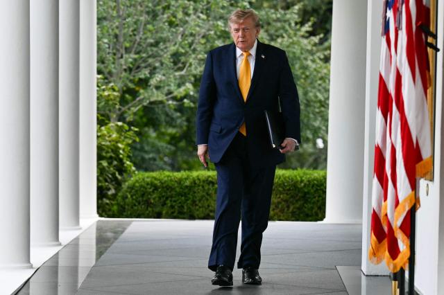 US President Donald Trump arrives to speak in the Rose Garden of the White House in Washington, DC, on August 24, 2026. (Photo by Jim WATSON / AFP)