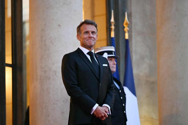 France's President Emmanuel Macron awaits the arrival of Saudi Arabia's Crown Prince Mohammed bin Salman for a State diner in his honour at the Elysee Palace in Paris on August 24, 2026. (Photo by LOU BENOIST / AFP)